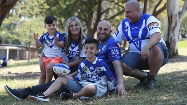 Supporters for life: Ali Jawad with his extended family of Bulldogs fans.
