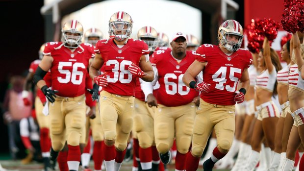 On the big stage: Jarryd Hayne and the San Francisco 49ers run onto the field at Levi's Stadium.