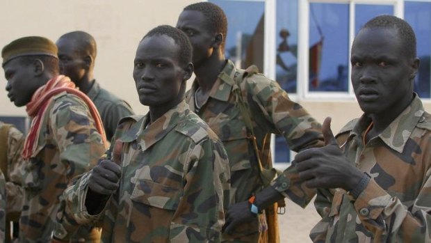 Thumbs up: South Sudanese government soldiers in Bor.