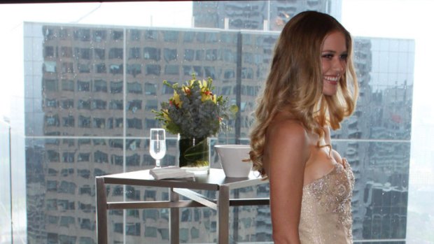 "Curvaceous beauty" ... Scherri-Lee Biggs models the Miss Universe Australia official evening gown.