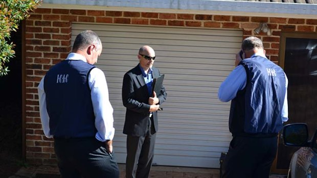 Follow-up: ICAC officials outside Richard Torbay's Armidale home.