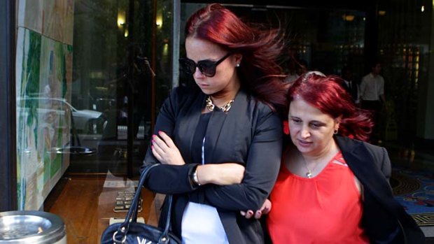 Illicit search: Jenna-Lee Hughes (above left) leaves court on Tuesday.