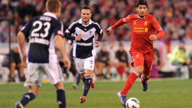 Money maker ... Liverpool's Luis Suarez in action against the Melbourne Victory.