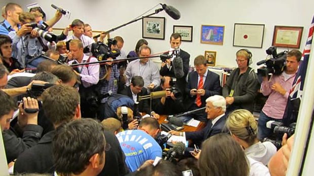 Bob Katter addresses an impromptu press conference in his office at Parliament House in Canberra today.