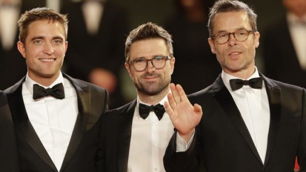 Robert Pattinson, left, and Guy Pearce, right, with David Michod, the Australian who will direct <i>War Machine</i>.