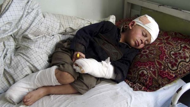 In hospital ... a boy wounded during the attack in Kunar.