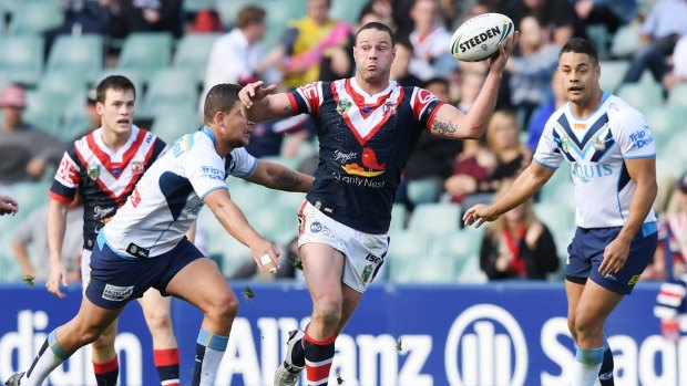 Juggling act: Roosters captain Boyd Cordner grabs a loose ball to go on the attack.