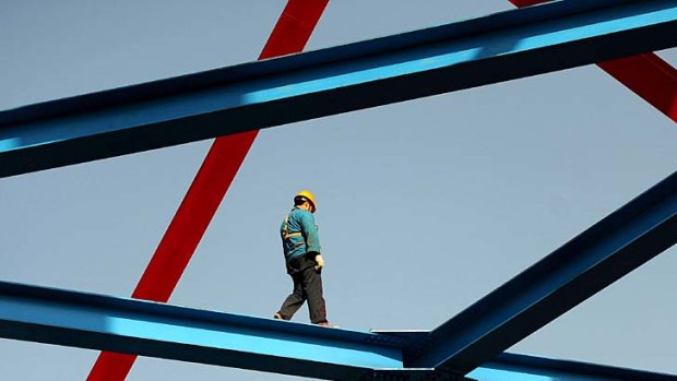 "Monopoly" ...  a worker on the Hefei construction site of one of China's delay-hit rapid train projects.