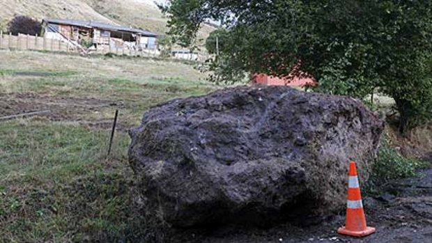 The boulder which smashed through the house.