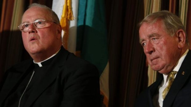 Cardinal Timothy Dolan and St Patrick's Day parade chairman John Dunleavy announce the lifting of the ban.