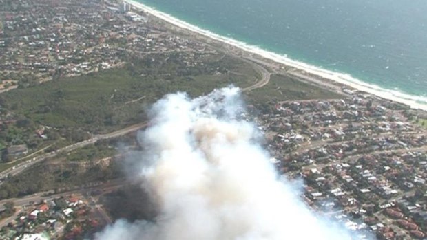 Residents are being evacuated and roads are closed around the bushfire.