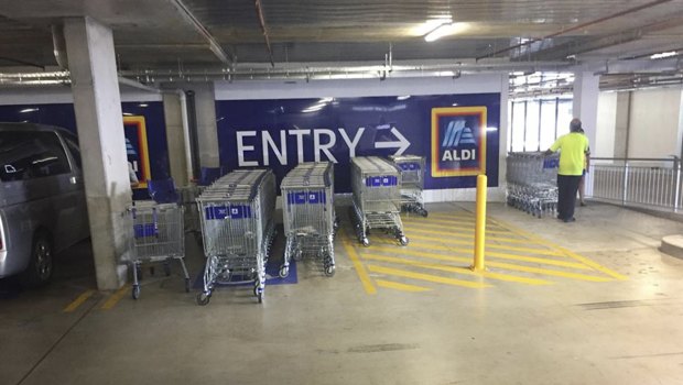 Trollies stored in a disabled parking space at Aldi at Glenmore Park Town Centre this month.