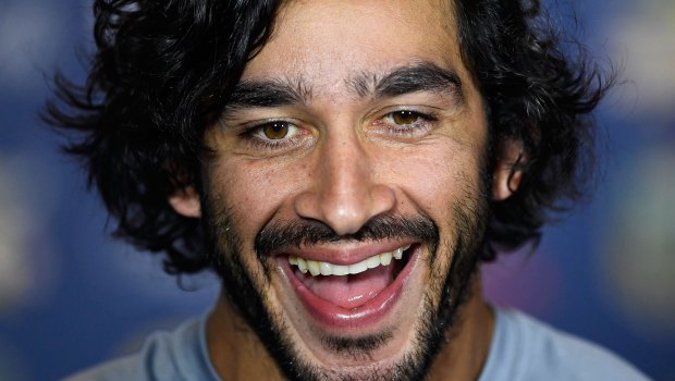 Johnathan Thurston laughing during a pre match interview.
