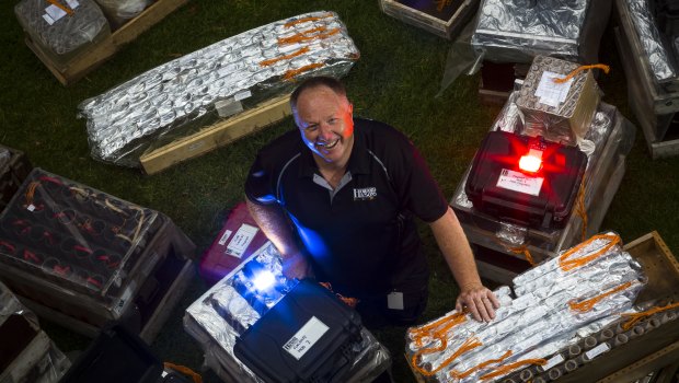 Pyrotechnician Rusty Johnson shows off his fireworks ready to explode over Melbourne's skies for New Year's Eve. 
