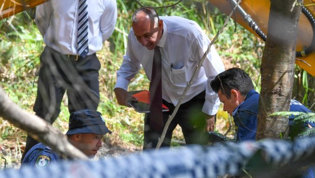 Matthew Leveson's former boyfriend Michael Atkins leading NSW Police to search an area of the Royal National Park, near Waterfall.