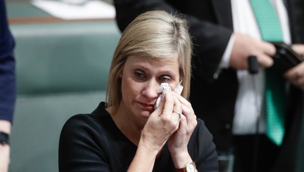 Labor MP Susan Lamb wipes away tears following her speech in the House of Representatives on Wednesday.
