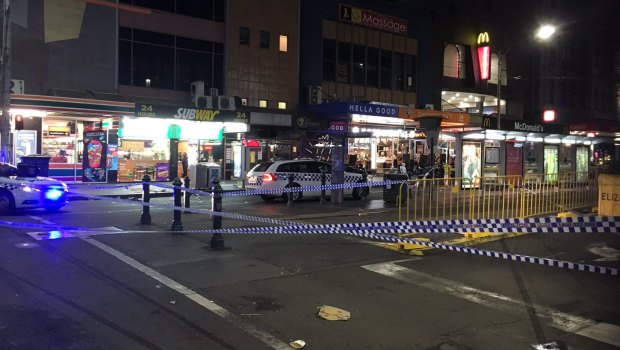 Police at the scene of the stabbing in Melbourne's CBD on Monday morning.