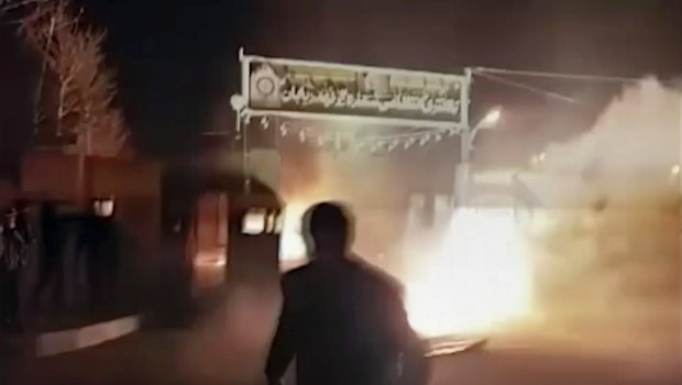 An attack on Iran police station in Qahdarijan, Iran. 