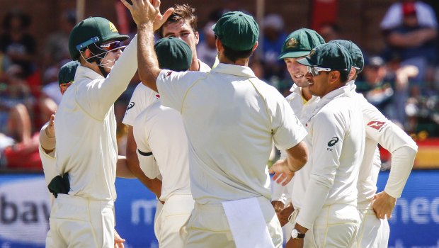 Fiery affair: The Aussies celebrate a wicket in what would be a second Test defeat to South Africa.