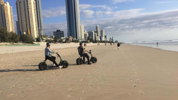 Unauthorised motorised vehicles, similar to those shown above, could be banned on and around Gold Coast beaches