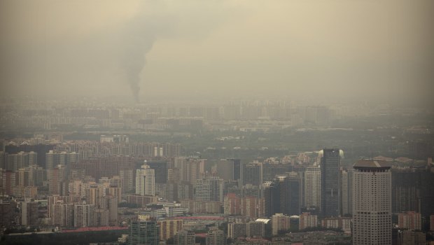 Smoke rises above Beijing on a moderately polluted day in August 2017.