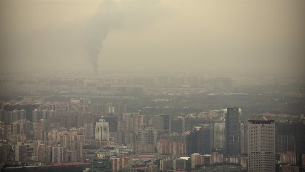 Smoke rises above Beijing on a moderately polluted day in August 2017.