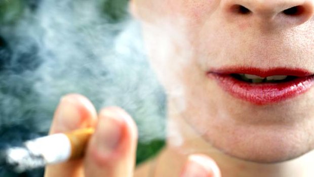 More than 100 Queenslanders have been fined since laws were introduced banning smoking near bus stops, taxi ranks and ferry terminals.