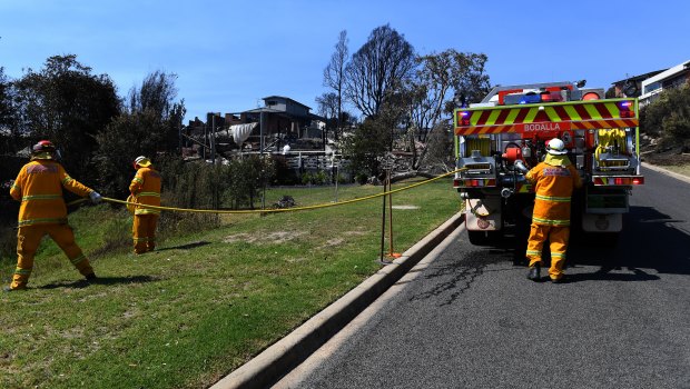 The Rural Fire Service was on scene within 15 minutes of the first triple zero calls, but declined offers for help from NSW Fire and Rescue until the fire was bearing down on Tathra's streets.