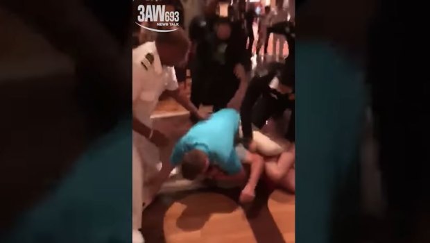 An image taken from mobile phone footage of the violent brawl on board the Carnival Legend.