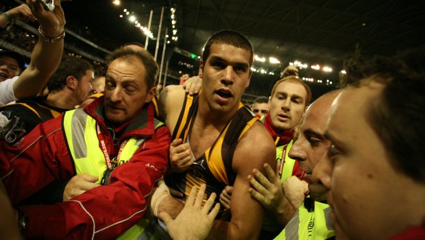 Lance Franklin is mobbed after kicking the ton in 2008