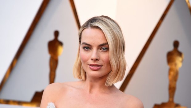 Margot Robbie arrives at the Oscars.