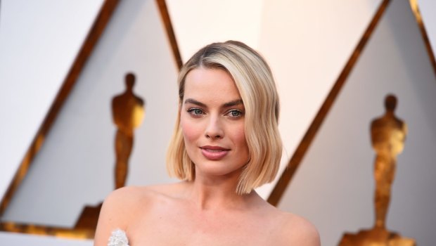 Margot Robbie arrives at the Oscars.