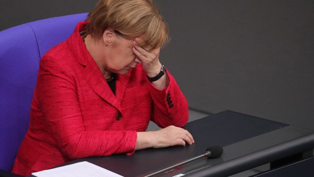 Negotiating a coalition has been a headache for Angela Merkel. 