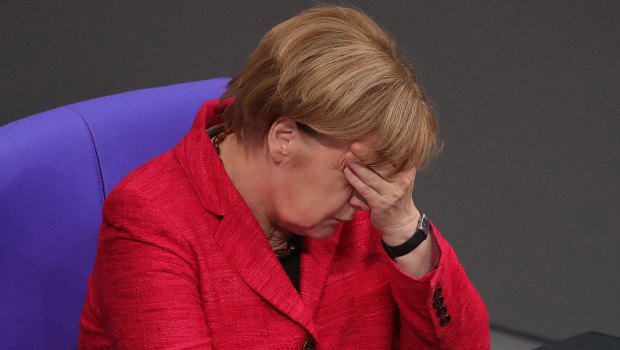 Negotiating a coalition has been a headache for Angela Merkel. 