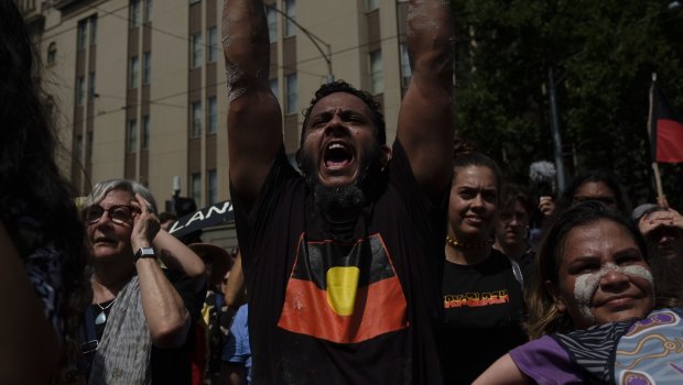 An 'invasion day' protester in Melbourne.