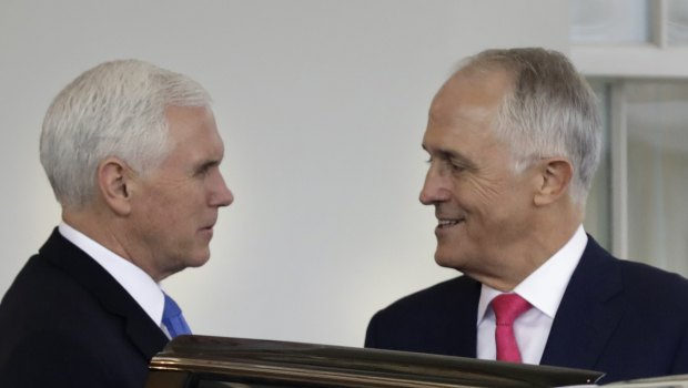 Australian Prime Minister Malcolm Turnbull is escorted by Vice President Mike Pence after his meetings at the White House.