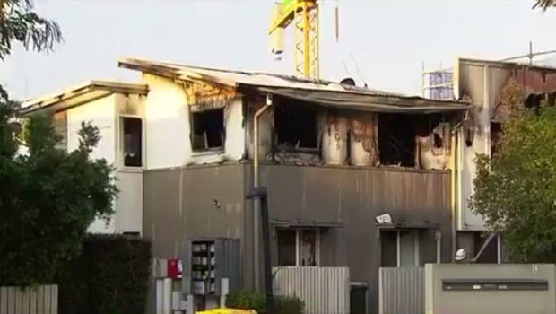 The alleged arson attack caused extensive damage to the woman's unit and several neighbouring residences.