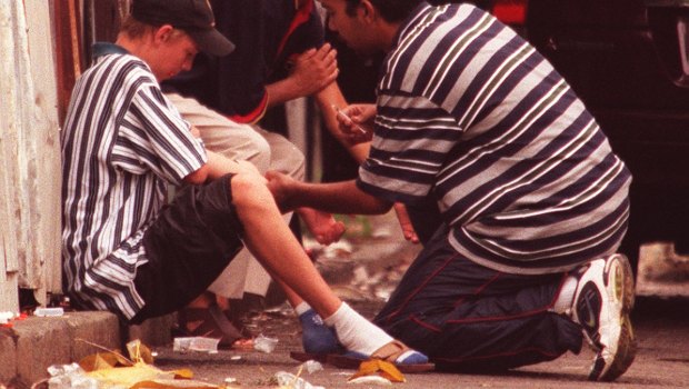 Heroin users on the footpath in Redfern in 1999; a Sun-Herald photo that sparked the drug summit. 
