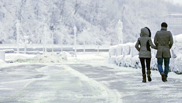 Tourists brave temperatures as low as -14 celsius in Ontario, Canada.