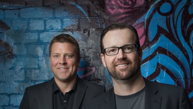 Aconex founders Leigh Jasper and Rob Philpott will each walk away with a cool $100 million.