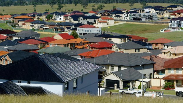 New mortgage lending fell in December, as house prices also dipped in Melbourne and Sydney.