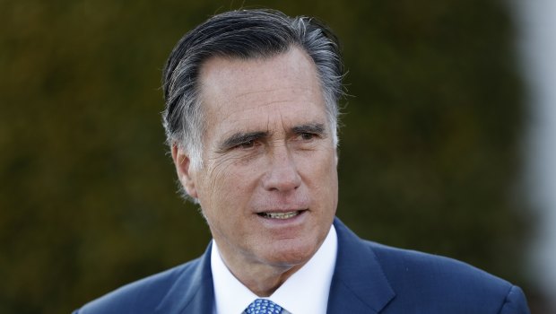 Mitt Romney talks to media after meeting with President-elect Donald Trump in November 2016.