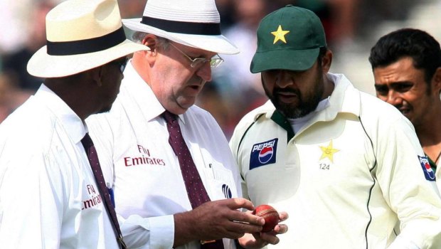 Chequered history: Umpires Billy Doctrove and Darrell Hair examine the match ball with Pakistan captain Inzamam-ul-Haq during the fourth Test at the Oval in 2006. Pakistan forfeited the match to England in protest against allegations over ball tampering.