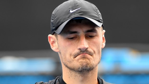 Struggling: Bernard Tomic has lost his first singles match after returning from a stint on reality TV.