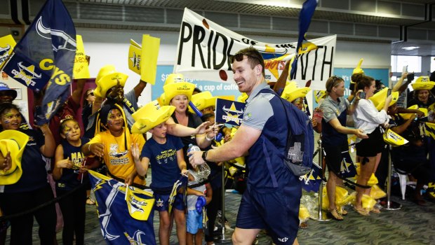 Michael Morgan of the Cowboys is farewelled by fans  at the Townsville Airport ahead of the NRL Grand Final at ANZ Stadium in Sydney this weekend.