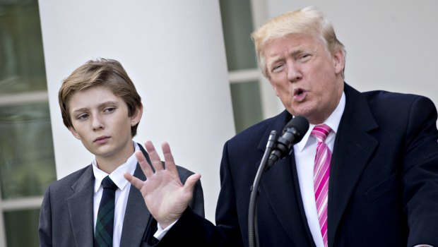Barron Trump, left, with his father in November.