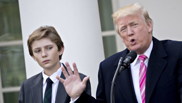 Barron Trump, left, with his father in November.