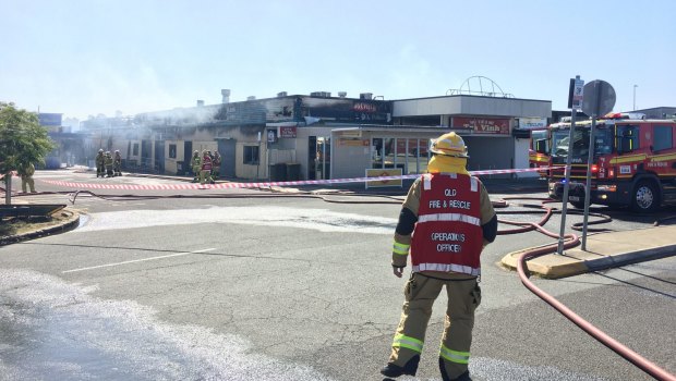 Fire crews battled a large blaze at Inala's Civic Centre on Saturday morning. 