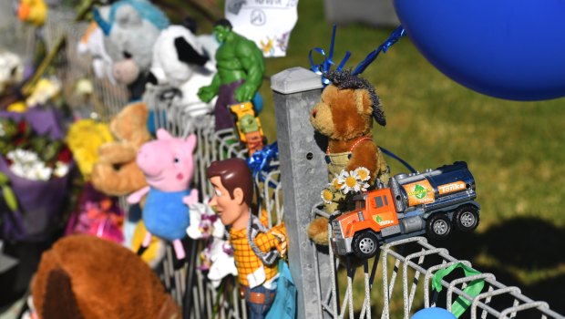 Brodie's classmates left a makeshift shrine to their friend made of toys attached to the front fence.
