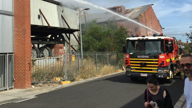 Firefighters battle a blaze at the former Hoffman Brickworks site in Brunswick on Saturday.